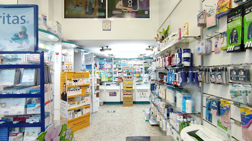 Farmacia Puente Colgante (Ldos. Elena González Vaamonde y Carlos Gómez González)